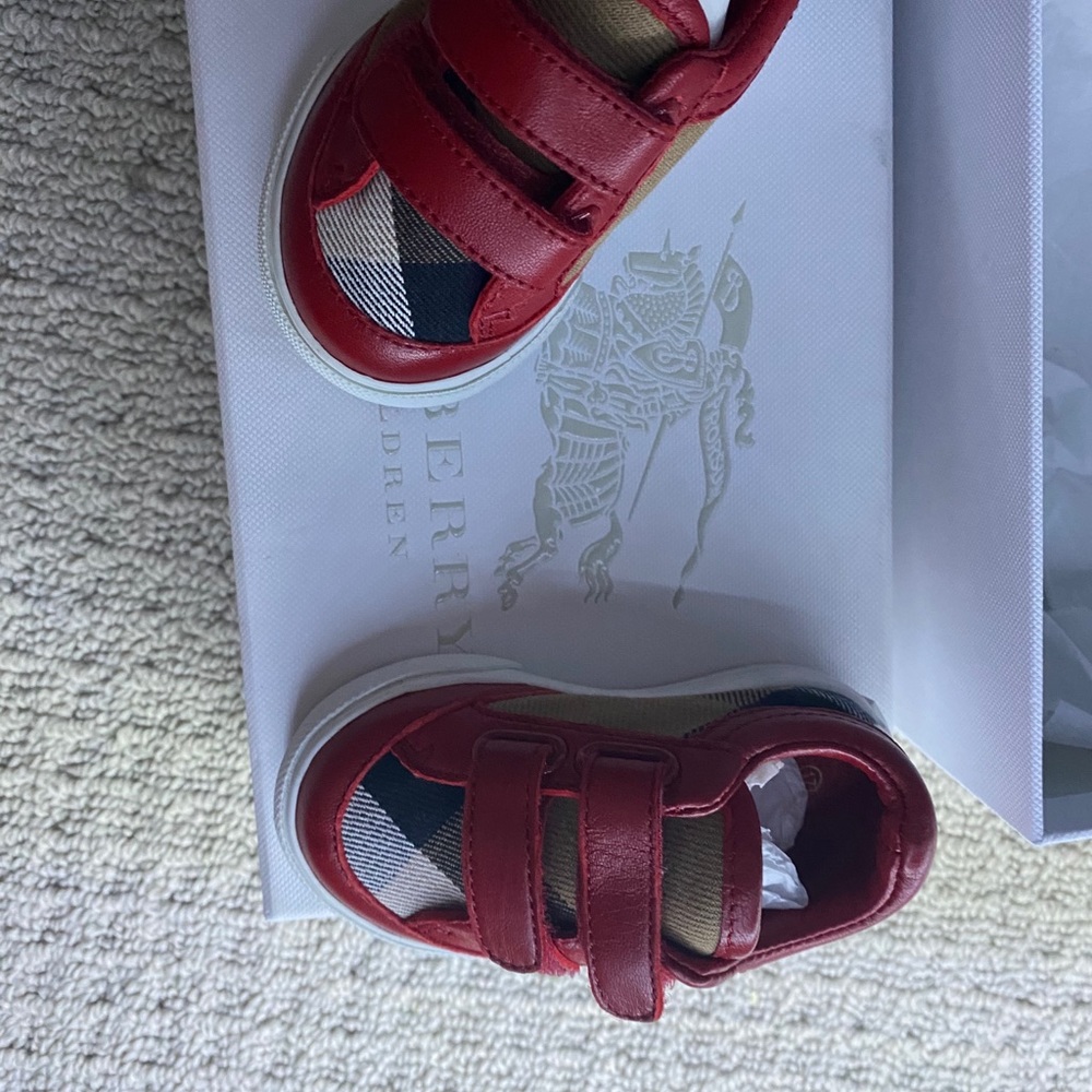 A bundle of baby authentic Burberry items.